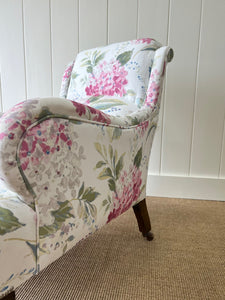 An Antique English Oak Floral Lounge Chair