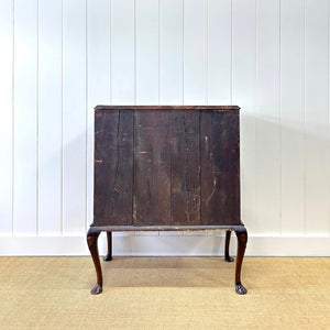 A Queen Anne style figured walnut chest on stand c1750