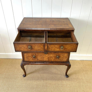 A Queen Anne style figured walnut chest on stand c1750