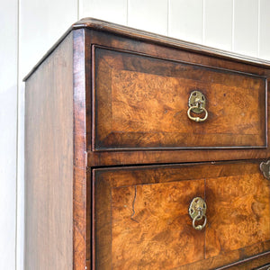 A Queen Anne style figured walnut chest on stand c1750