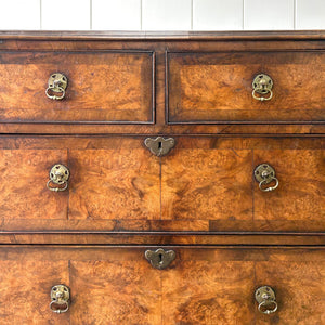 A Queen Anne style figured walnut chest on stand c1750