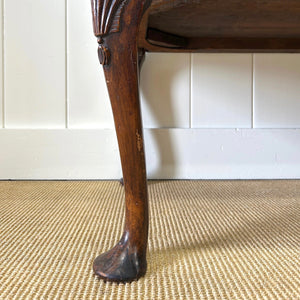 A Queen Anne style figured walnut chest on stand c1750