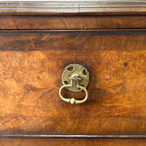 A Queen Anne style figured walnut chest on stand c1750