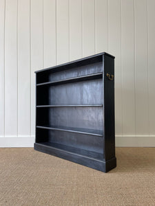A Short and Narrow 19th Century English Ebonized Mahogany Bookcase