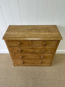 An Antique English Pine Chest of Drawers Dresser with Wooden Knobs