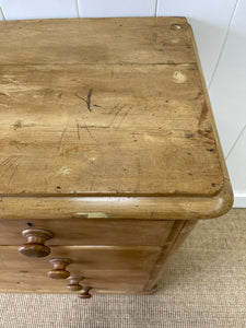 An Antique English Pine Chest of Drawers Dresser with Wooden Knobs