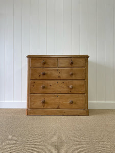 An Antique English Pine Chest of Drawers Dresser with Wooden Knobs