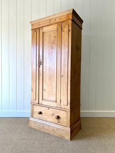 A Handsome English 19th Pine Cupboard with Dark Wooden Knobs