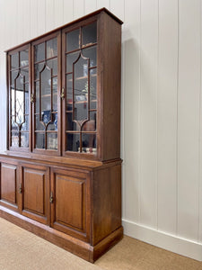 A 19th Century English Oak Bookcase or Breakfront by Maple & Co, London