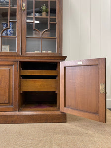 A 19th Century English Oak Bookcase or Breakfront by Maple & Co, London