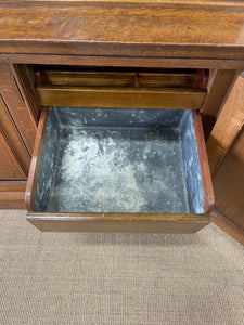 A 19th Century English Oak Bookcase or Breakfront by Maple & Co, London