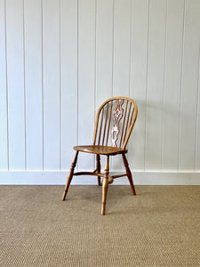 A Set of Four Ash Crinoline Stretcher Windsor Chairs