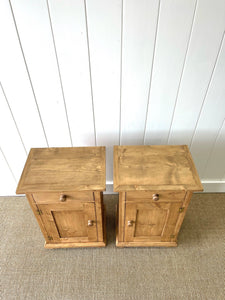 A Charming Pair of English Pine Nightstands with Bun Feet