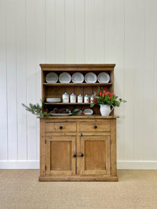 An Early 19th Century Low Pine Irish Dresser or Cupboard with Wooden Knobs