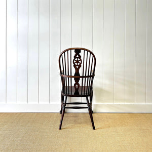 A Georgian Windsor Wheel Back Elbow Chair in Elm & Ash
