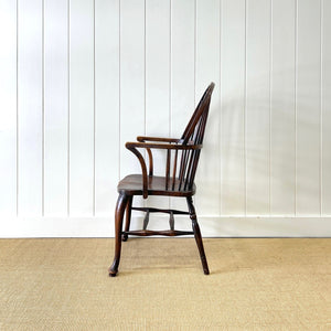 A Georgian Windsor Wheel Back Elbow Chair in Elm & Ash