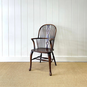 A Georgian Windsor Wheel Back Elbow Chair in Elm & Ash