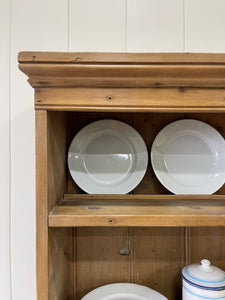 An Early 19th Century Low Pine Irish Dresser or Cupboard with Wooden Knobs