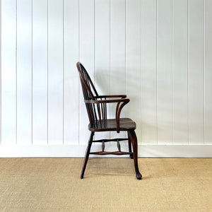 A Georgian Windsor Wheel Back Elbow Chair in Elm & Ash
