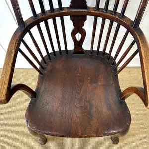 A Georgian Windsor Wheel Back Elbow Chair in Elm & Ash