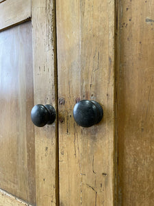 An Early 19th Century Low Pine Irish Dresser or Cupboard with Wooden Knobs