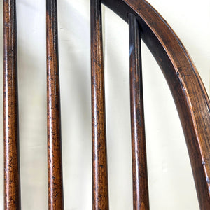 A Georgian Windsor Wheel Back Elbow Chair in Elm & Ash
