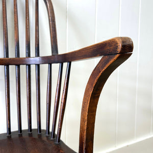 A Georgian Windsor Wheel Back Elbow Chair in Elm & Ash