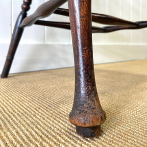 A Georgian Windsor Wheel Back Elbow Chair in Elm & Ash