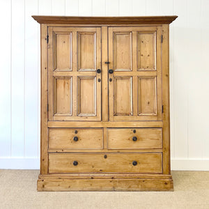 An 18th Century English Pine Linen Press Cupboard