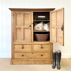 An 18th Century English Pine Linen Press Cupboard