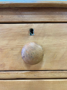 An Antique English Pine Chest of Drawers Dresser with Dark Wooden Knobs
