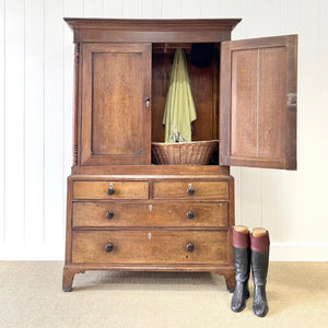 A Large Early 19th Century English Oak Linen Press Housekeepers Cupboard