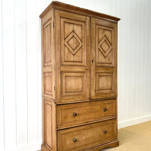 A 19th Century Irish Rustic Pine Linen Press Cabinet
