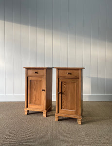A Charming Pair of English Pine Nightstands
