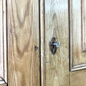 A 19th Century Irish Rustic Pine Linen Press Cabinet