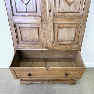 A 19th Century Irish Rustic Pine Linen Press Cabinet