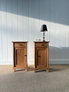 A Charming Pair of English Pine Nightstands