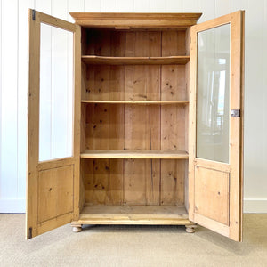 A 19th Century Pine Bookcase with Glazed Doors