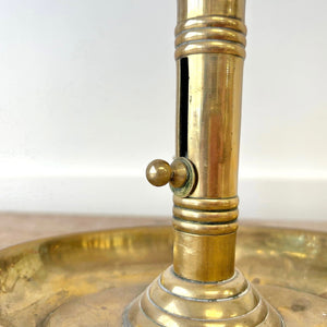 An Antique English Brass Chamber Stick