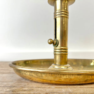 An Antique English Brass Chamber Stick