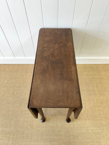 An Antique 18th Century Drop Leaf Dining Table with Pad Feet