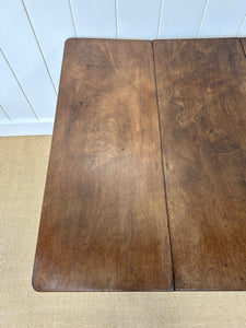An Antique 18th Century Drop Leaf Dining Table with Pad Feet