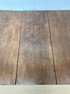 An Antique 18th Century Drop Leaf Dining Table with Pad Feet