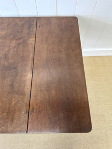 An Antique 18th Century Drop Leaf Dining Table with Pad Feet