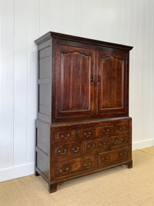 A Stately English 18th Century Oak Tack Cupboard
