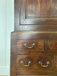 A Stately English 18th Century Oak Tack Cupboard