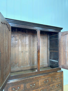 A Stately English 18th Century Oak Tack Cupboard
