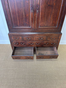 A Stately English 18th Century Oak Tack Cupboard