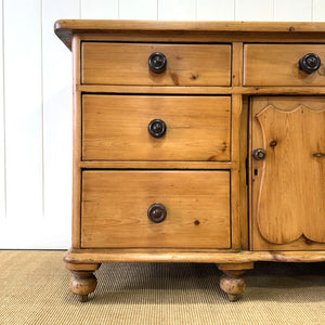 An English Country 7 Drawer Pine Buffet or Sideboard