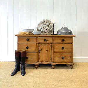 An English Country 7 Drawer Pine Buffet or Sideboard